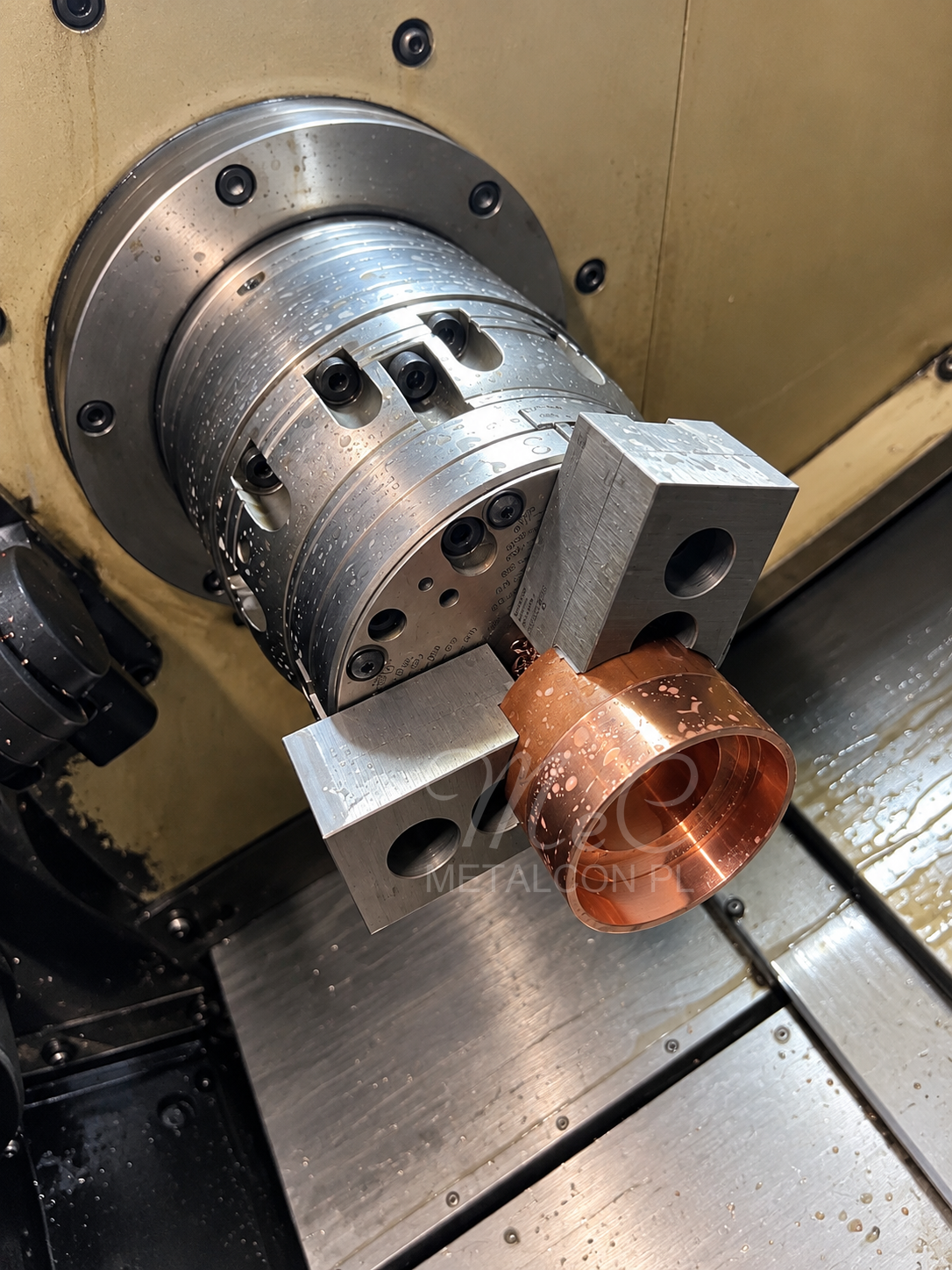 Copper part secured in a lathe chuck